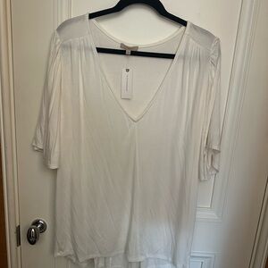 New With Tags - Anthropologie off white tee with flutter sleeves, size XL.